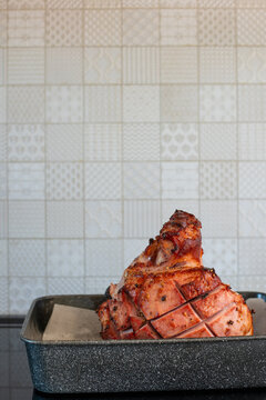 christmas ham in roasting dish