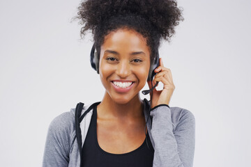 Portrait, woman and headset for call centre, communication and smile by white background. African...