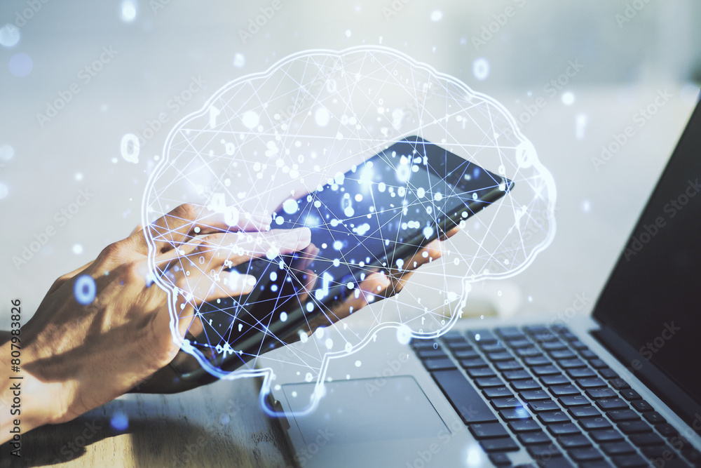 Poster double exposure of creative human brain microcircuit and hand working with a digital tablet on backg