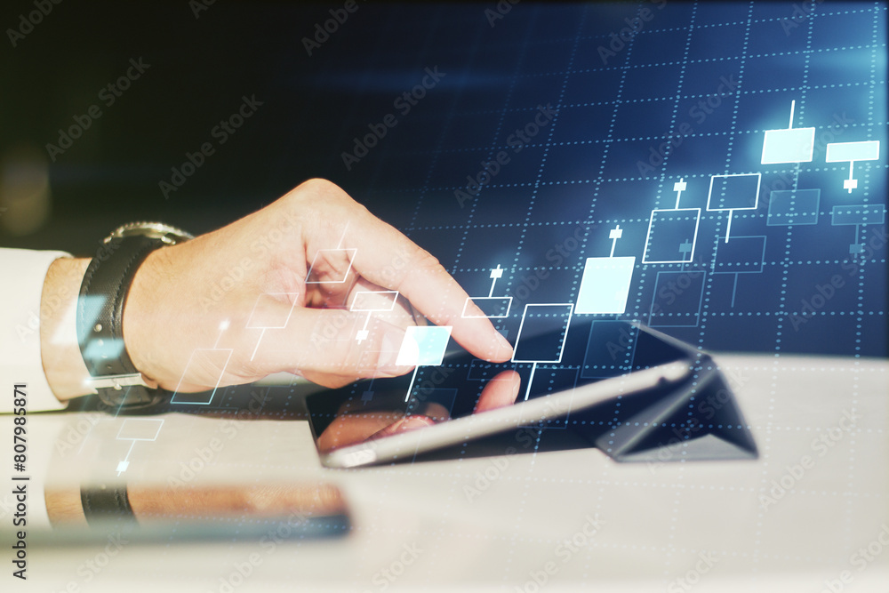 Poster multi exposure of abstract financial graph and hand working with a digital tablet on background, fin
