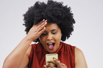 Black woman, wow and cellphone in studio for surprise, emoji and contact and social media for...
