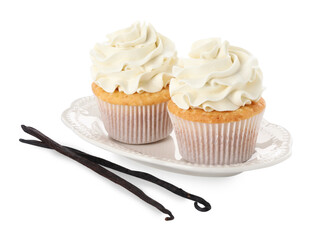 Tasty cupcakes with cream and vanilla pods isolated on white