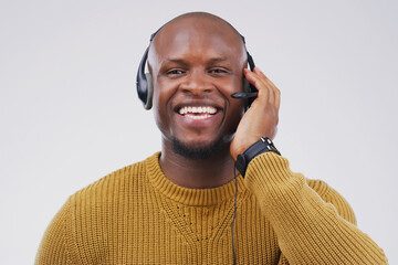 African man, portrait and studio with headset for customer service or call center, smile for...