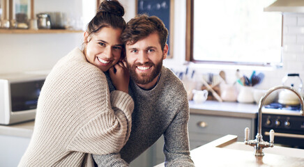 Couple, people and home on portrait in kitchen with smile, together and support for unity....