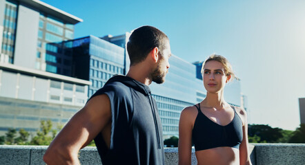 Fitness, talking and couple in city for running workout, outdoor training and exercise in London,...