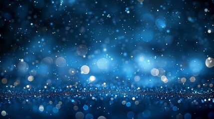 Abstract background with bokeh lights and glitter on a blue dark night sky