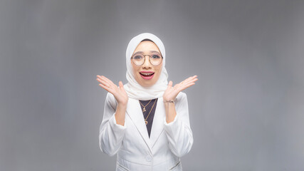 Portrait of Muslim woman in office attire and wearing a hijab. Corporate  or business people...