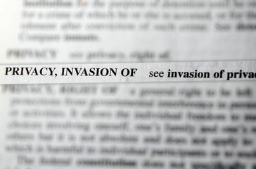 close up photo of the words invasion of privacy