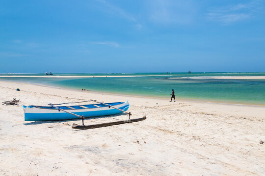 a lakana boat in Nosy kely beach during low tide. Morondava, madagascar