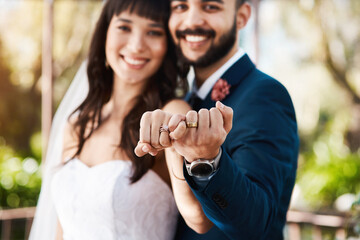 Happy couple, marriage and hands with wedding rings for engagement, proposal or outdoor ceremony....