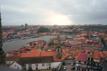 Panoramic view of Douro river and Porto skyline at dusk