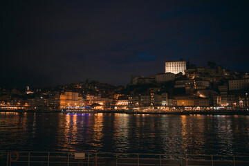 Twilight view of the Douro river and cityscape in Porto, Portugal