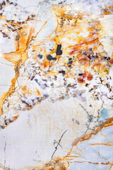 Beautiful marble texture interspersed with orange onyx. Vertical image.