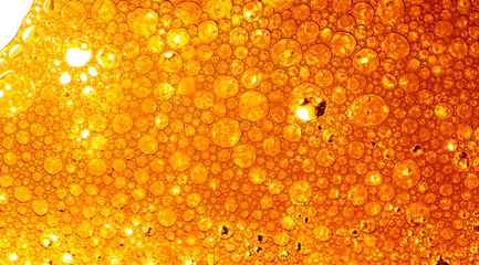 Yellow drink bubble texture close-up,Beer Background Ice Cold Pint With Water Drops...