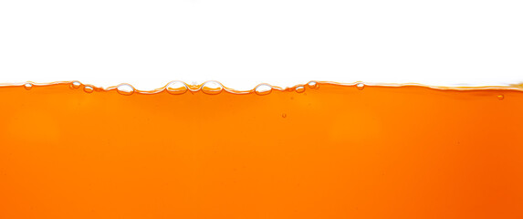 Orange juice texture, close-up, macro, isolated white background,Close up bright orange juice texture for health and nature waves