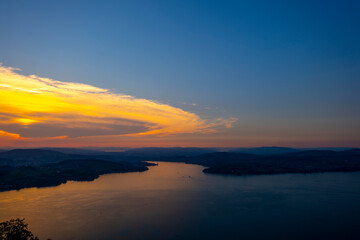 Naklejka premium Aerial View over Lake Lucerne and Mountain in Sunset in Lucerne, Switzerland.