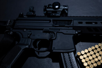 Modern Elegant Assault Rifle and Bullet on Grey Background in Switzerland.