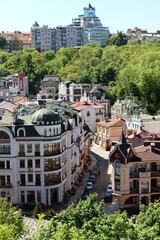 Fototapeta premium Ukraine, Kiev. Kyiv, Podol, Vozdvizhenka, city, architecture, view, travel, cityscape, building, panorama, landscape, house, urban, roof, landmark, town,