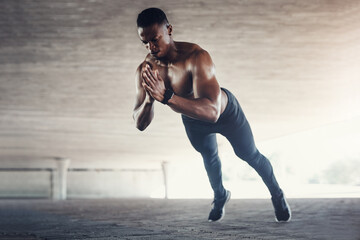 African man, push up and shirtless with balance in city, strong and healthy muscle with power on...