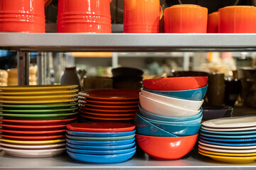 Stacked Colorful Plates and Bowls
