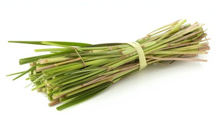 Fresh lemongrass stalks tied in a small bundle, their vibrant green color and fibrous texture prominently displayed against a white background