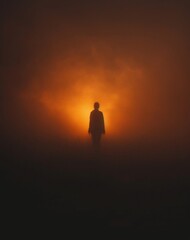 Fototapeta premium silhouette of a woman stands near fire