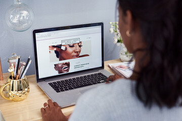 Beauty, blog and girl and back with screen, reading online and cosmetology for elearning. Browse, digital notes with laptop, pen and technology for social media on website and table
