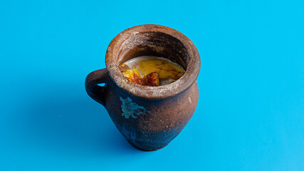 Piti soup in ceramic pot. Traditional mutton soup from Shaki region in Azerbaijan