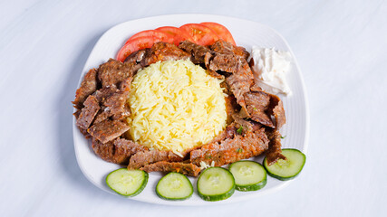 Beef rice portion doner kebab plate top view	