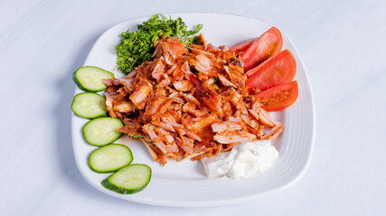 Chicken portion doner kebab plate top view	