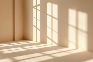 Fototapeta premium Abstract light beige wall, intricate interplays of light and shadow from the window.