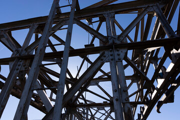 Aabndoned indutrial metal structure from rusty steel beams
