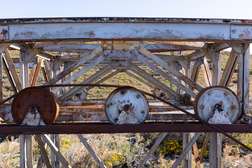 Metal wheel on steel structure rusted