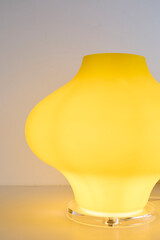Post-modern light with vintage glass shade. Lively yellow table lamp with modern wiring. 