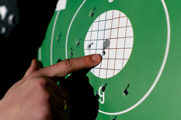 close up at a professional shooting range hit target location of impact professional shooting