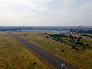 Aerial landscape of Tempelhofer Feld runway at abandoned airport in summer in Central Berlin