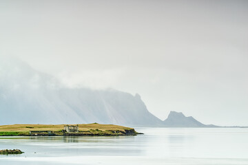 Ruin house in Hofn in a foggy morning, Iceland