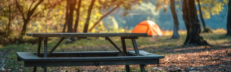 Serene Campsite with Tent and Wooden Table in Lush Park