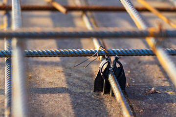 A sight of plastic rebar holders or supports demonstrates their essential role as integral...