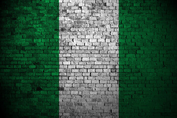 nigeria flag on brick wall © Hapelinium
