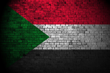 sudan flag on brick wall