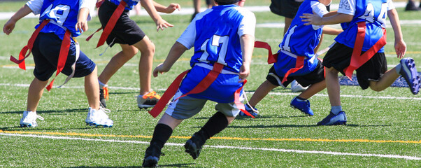 Young kids playing flag football