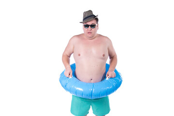 Vacations and holidays. Funny fat man with an inflatable blue circle posing in the studio on a white background. Fun and joy.