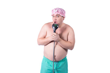 Good morning. Funny fat man washes in the shower and sings. The guy poses in the studio on a white background. Fun and joy.