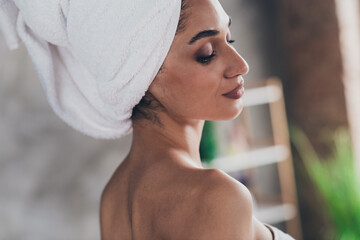 Cropped profile portrait of lovely peaceful lady no clothes white towel head wellbeing coziness...
