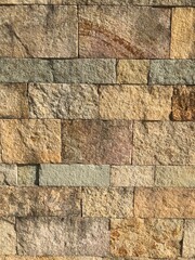 Revestimiento de piedra en un muro exterior de una casa