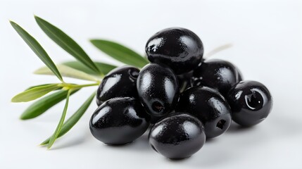 Close up of fresh Black Olives on a white Background