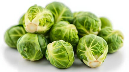 Close up of fresh Brussels Sprouts on a white Background