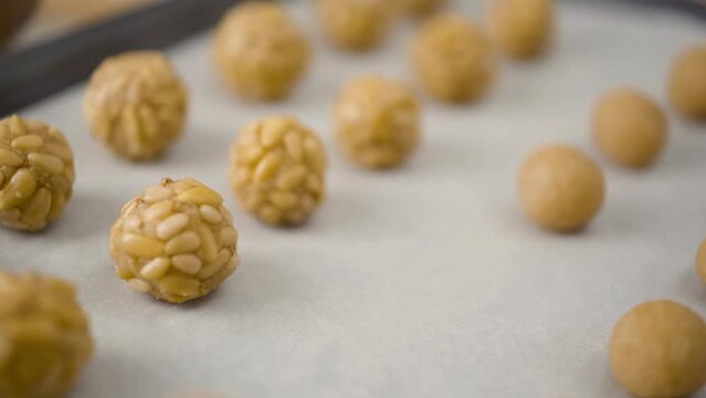 Preparation of panellets a traditional Spanish and Catalan sweets for All Saints Day and Halloween