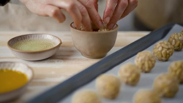 Preparation of panellets a traditional Spanish and Catalan sweets for All Saints Day and Halloween